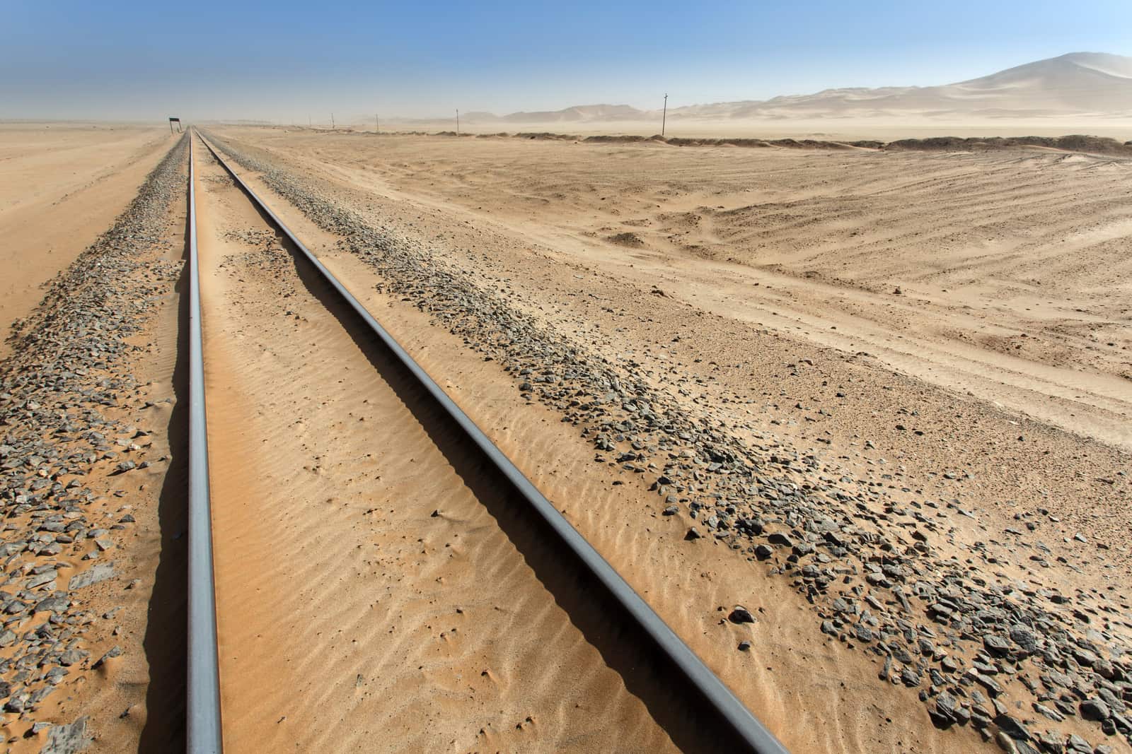 Railway line running through the desert